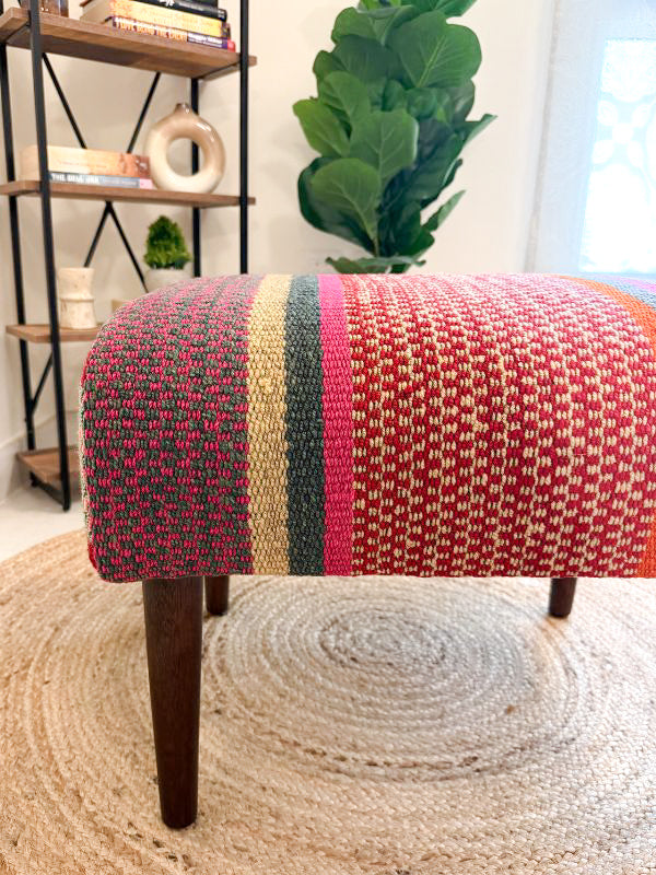 Upholstered bench featuring handwoven Andean frazada fabric with naturally dyed colors for modern home decor and interiors.