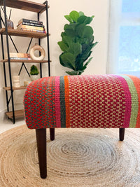 Upholstered bench featuring handwoven Andean frazada fabric with naturally dyed colors for modern home decor and interiors.