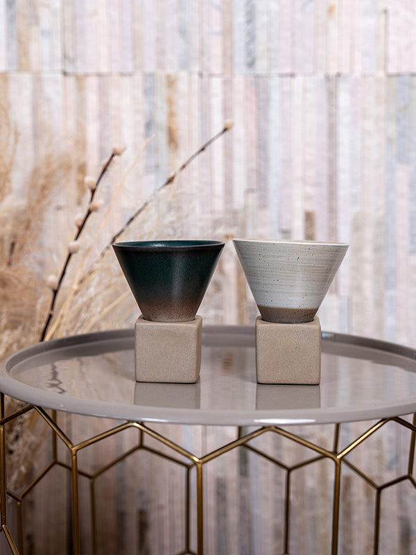 Cone-shaped ceramic serveware for individual desserts, ice cream, and parfaits.