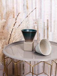 Cone-shaped ceramic serveware for individual desserts, ice cream, and parfaits.