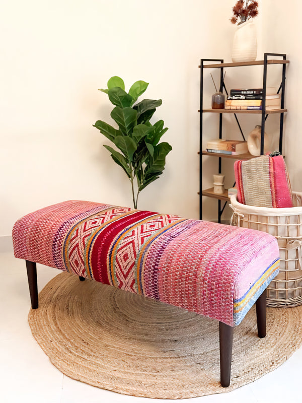 Upholstered bench featuring handwoven Andean frazada fabric with naturally dyed colors for modern home decor and interiors.