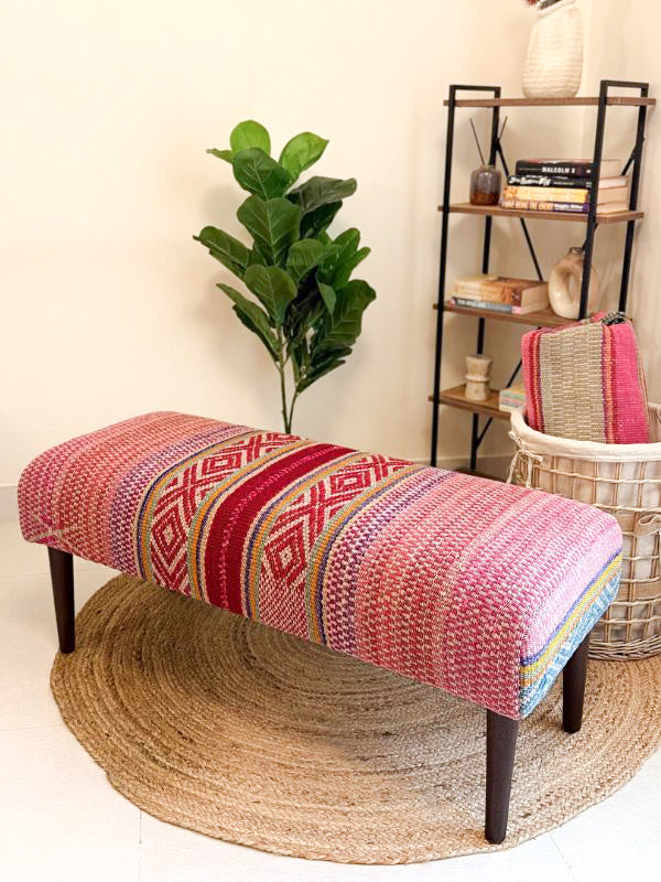 Upholstered bench featuring handwoven Andean frazada fabric with naturally dyed colors for modern home decor and interiors.
