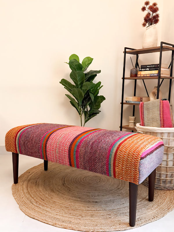 Upholstered bench featuring handwoven Andean frazada fabric with naturally dyed colors for modern home decor and interiors.
