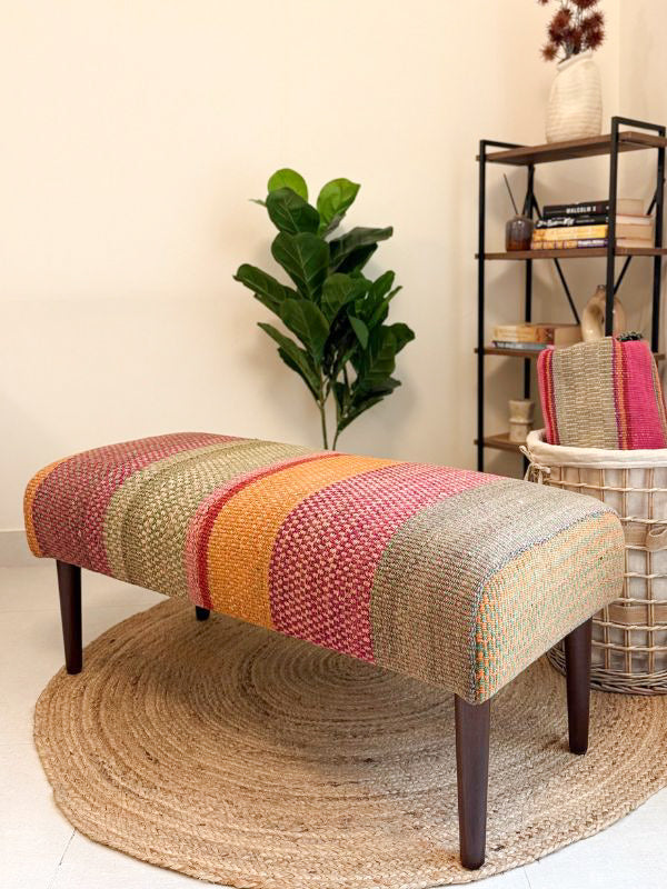 Upholstered bench featuring handwoven Andean frazada fabric with naturally dyed colors for modern home decor and interiors.