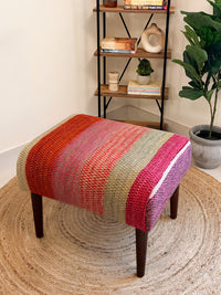 Upholstered bench featuring handwoven Andean frazada fabric with naturally dyed colors for modern home decor and interiors.
