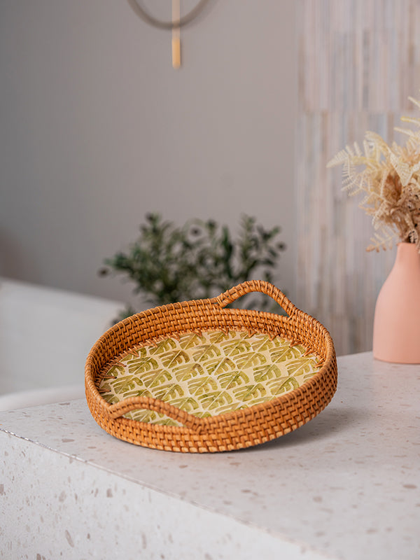 Full view of handwoven natural rattan tray with two side handles and inlay design