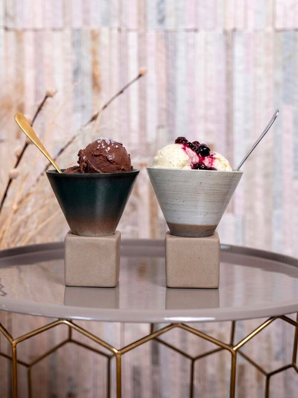 Cone-shaped ceramic serveware for individual desserts, ice cream, and parfaits.
