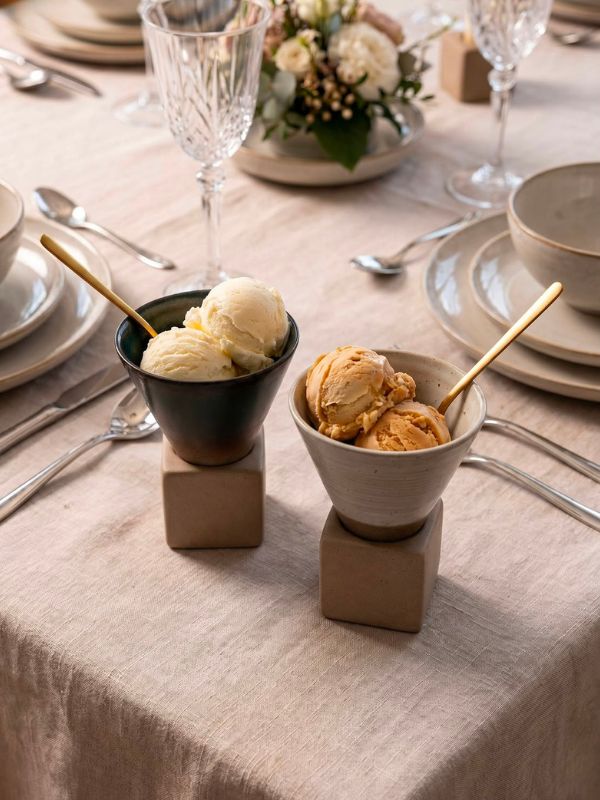 Cone-shaped ceramic serveware for individual desserts, ice cream, and parfaits.